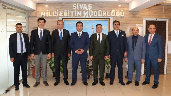 Ticaret ve Sanayi Odası Başkanı Mustafa Eken, Meclis Başkanı Çetin Yıldırım ve Yönetim Kurulu, Milli Eğitim Müdürümüz Ebubekir Sıddık Savaşçıyı Ziyaret Etti.