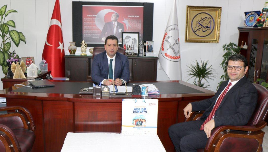 Sultanşehir Uluslararası Öğrenci Derneği Başkanı Mehmet Fatih Yıldız, Milli Eğitim Müdürümüz Ebubekir Sıddık Savaşçıyı Ziyaret Etti.